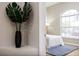 Bedroom corner featuring a large window and view of the front yard at 6047 Cason Way, Lakeland, FL 33812