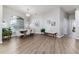 Light-filled dining area featuring sleek flooring and contemporary furnishings at 6047 Cason Way, Lakeland, FL 33812