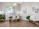 Elegant dining room with modern chandelier and plenty of natural light at 6047 Cason Way, Lakeland, FL 33812