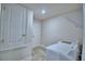 Well-lit laundry room features a washing machine and storage space, ensuring convenience at 2123 Cartgate Lane, Winter Haven, FL 33884