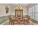 Formal dining room with elegant wood table and chandelier at 318 Crescent Ridge Rd, Auburndale, FL 33823