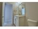 Simple bathroom with toilet and sink at 4081 Tullamore Ln, Auburndale, FL 33823