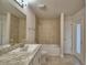 Bathroom with tub and shower combo at 4081 Tullamore Ln, Auburndale, FL 33823