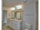 Double vanity bathroom with toilet at 4081 Tullamore Ln, Auburndale, FL 33823