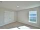 Bright bedroom with double door closet at 4081 Tullamore Ln, Auburndale, FL 33823