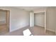 Bedroom with closet and access to hall at 4081 Tullamore Ln, Auburndale, FL 33823