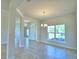 Bright dining room with tile floors and lots of natural light at 4081 Tullamore Ln, Auburndale, FL 33823