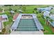 An aerial view of a shuffleboard court, surrounded by lush green grass at 5660 Sandpipers Dr, Lakeland, FL 33809