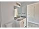 Bathroom featuring a sink with granite countertop, vanity, and mirror at 4039 Tullamore Ln, Auburndale, FL 33823