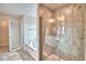 Bathroom features a soaking tub, glass shower, and tile flooring throughout at 4039 Tullamore Ln, Auburndale, FL 33823