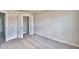 This carpeted bedroom features a closet and neutral walls at 4039 Tullamore Ln, Auburndale, FL 33823