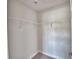 Walk-in closet with wire shelves and carpet at 4039 Tullamore Ln, Auburndale, FL 33823
