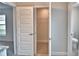 Hallway view shows closet and bathroom entrances at 4039 Tullamore Ln, Auburndale, FL 33823