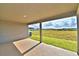 Covered patio with views of the field and sky at 4039 Tullamore Ln, Auburndale, FL 33823