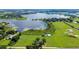 Aerial view of property with lake access and new construction at 420 W Gates Ave, Lake Hamilton, FL 33851