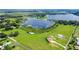 Aerial view of property with lake access and new construction at 420 W Gates Ave, Lake Hamilton, FL 33851