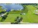 Aerial view of property with lake access and existing home at 420 W Gates Ave, Lake Hamilton, FL 33851