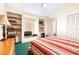 Bedroom with built in shelving, natural light, closet, and ensuite bathroom access at 9650 W Lake Marion Rd, Haines City, FL 33844