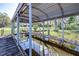 Covered boat lift offering protection and easy access to the serene lake waters at 9650 W Lake Marion Rd, Haines City, FL 33844