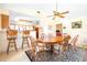 Inviting dining room area with a large table and convenient access to kitchen at 9650 W Lake Marion Rd, Haines City, FL 33844