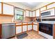 Bright kitchen with updated appliances and light-filled window over sink at 9650 W Lake Marion Rd, Haines City, FL 33844