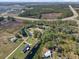 Aerial view of a home with a pool and large yard at 222 Rod Ln, Davenport, FL 33837