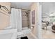 Bathroom with shower/tub combo and toilet at 222 Rod Ln, Davenport, FL 33837