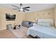 Spacious bedroom with a bed and TV at 222 Rod Ln, Davenport, FL 33837