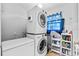 Laundry room with washer, dryer, and storage at 222 Rod Ln, Davenport, FL 33837