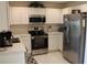 Modern kitchen featuring stainless steel appliances at 1300 Lucerne Loop Ne Rd, Winter Haven, FL 33881