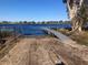 Private dock access to a peaceful lake, ideal for water activities at 1300 Lucerne Loop Ne Rd, Winter Haven, FL 33881