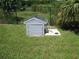 Small well house in a grassy backyard at 1300 Lucerne Loop Ne Rd, Winter Haven, FL 33881