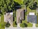 Aerial view of a single-Gathering home showcasing the backyard and a fenced in yard at 2158 Mirasol Dr, Winter Haven, FL 33881