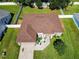 Aerial view showing house, yard, and shed at 5643 Fischer Dr, Lakeland, FL 33812