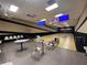 Bowling alley with lanes, electronic scoring system, bowling ball return, tables, chairs, and modern lighting at 1202 Ashton Palms Dr # 6, Lake Wales, FL 33859