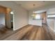 Open dining area adjacent to the kitchen with stylish lighting and flooring at 1202 Ashton Palms Dr # 6, Lake Wales, FL 33859