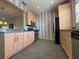 Well-appointed kitchen featuring stainless steel appliances and ample cabinet space at 1202 Ashton Palms Dr # 6, Lake Wales, FL 33859