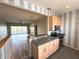 Bright kitchen with breakfast bar overlooking the living room and outdoor views at 1202 Ashton Palms Dr # 6, Lake Wales, FL 33859