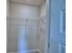 A view into a closet with wire shelving for organized storage at 1476 Leamington Lane, Winter Haven, FL 33884