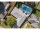 Aerial view of a home and backyard featuring a well-maintained pool and patio at 2014 Bardmoor, Winter Haven, FL 33884
