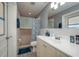 Functional bathroom with shower, vanity, and ample lighting for daily routines at 2014 Bardmoor, Winter Haven, FL 33884