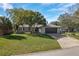Charming single-story home with a well-maintained front yard and a two car garage at 2014 Bardmoor, Winter Haven, FL 33884