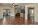 Open-concept living room boasts hardwood floors and provides seamless flow into other rooms at 2014 Bardmoor, Winter Haven, FL 33884