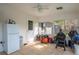 Enclosed back porch with windows and tile flooring can be used for storage or a workshop at 2014 Bardmoor, Winter Haven, FL 33884