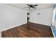 Simple bedroom with hardwood floors and ceiling fan at 3537 Julius Estates Blvd, Winter Haven, FL 33881