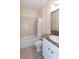 Bathroom with tub, shower, toilet, and vanity at 4104 Martindale Loop, Winter Haven, FL 33884