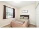 Cozy bedroom with a full-size bed and ample closet space at 4104 Martindale Loop, Winter Haven, FL 33884