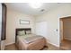 Simple bedroom with double bed and ample closet space at 4104 Martindale Loop, Winter Haven, FL 33884