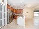 Modern kitchen with stainless steel appliances and granite countertops at 4104 Martindale Loop, Winter Haven, FL 33884