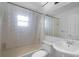 Clean bathroom with tub shower and vanity at 752 Hunt Dr, Lake Wales, FL 33853